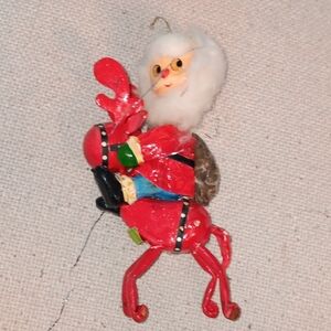 Santa Claus Riding Reindeer Ornament